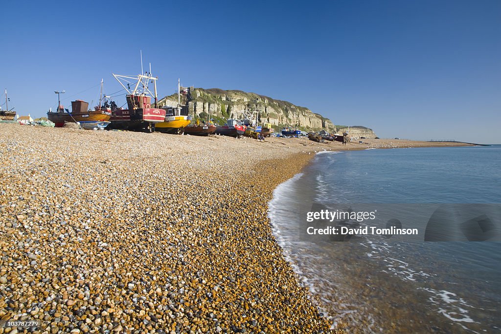 The Stade pebble beach with fishing fleet on shore.