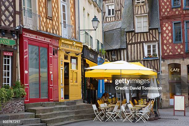 colourful cafes in corner of place sainte-anne. - rennes france stock pictures, royalty-free photos & images