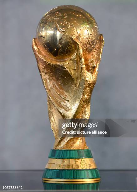 Remake of the FIFA world cup trophy is on display during a press conference at the headquarters of the German Football Association in Frankfurt Main,...