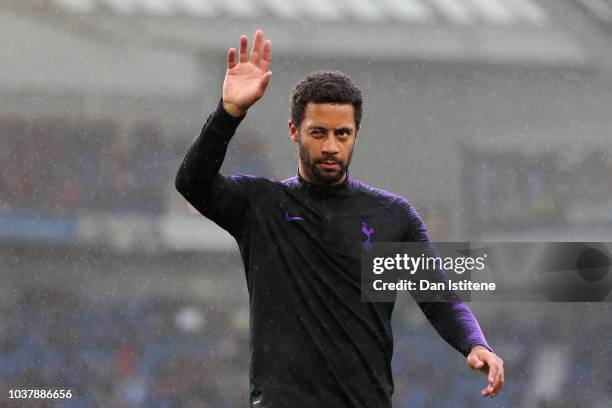 Mousa Dembele of Tottenham Hotspur waves to the fans during the warm-up before the Premier League match between Brighton & Hove Albion and Tottenham...