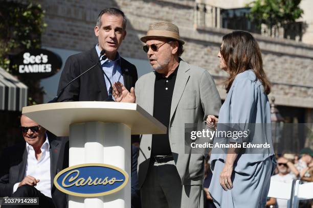 Los Angeles Mayor Eric Garcetti, comedian Billy Crystal and producer Janice Crystal attend the Palisades Village grand opening private ribbon-cutting...