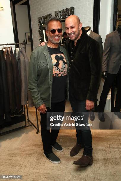 Ravi Bhamre and John Varvatos attend the John Varvatos Madison Avenue Store Personal Appearance on September 22, 2018 in New York City.