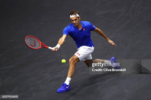 Team Europe Roger Federer of Switzerland returns a shot against Team World Nick Kyrgios of Australia during their Men's Singles match on day two of...