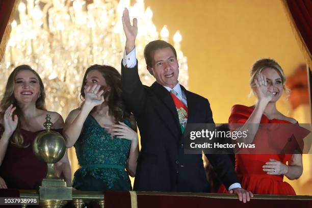 Enrique Peña Nieto, president of Mexico greets with his wife Angelica Rivera during the Mexico Independence Day Celebrations at Zocalo on September...