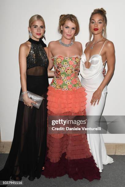 Caroline Daur, Lady Kitty Spencer and Jasmine Sanders walk the red carpet ahead of amfAR Gala at La Permanente on September 22, 2018 in Milan, Italy.