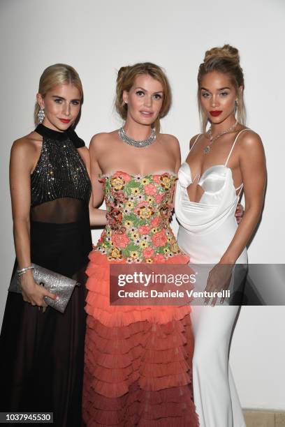 Caroline Daur, Lady Kitty Spencer and Jasmine Sanders walk the red carpet ahead of amfAR Gala at La Permanente on September 22, 2018 in Milan, Italy.