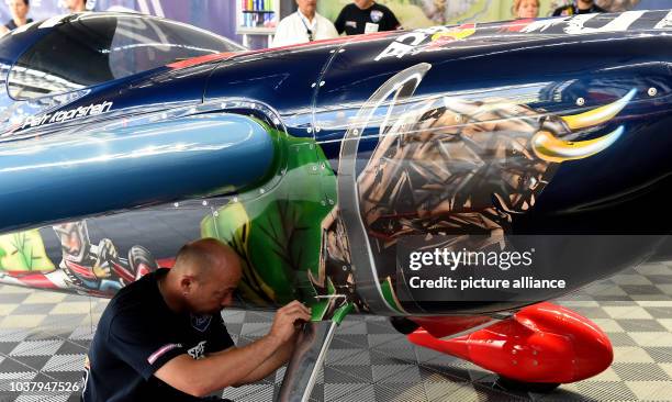 Technician preparing the machine of Petr Kopfstein for the start at the Red Bull Air Race at Lausitzring in Klettwitz, Germany, 4 September 2016....
