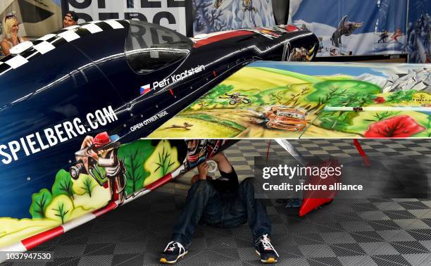 Technician preparing the machine of Petr Kopfstein for the start at the Red Bull Air Race at Lausitzring in Klettwitz, Germany, 4 September 2016....