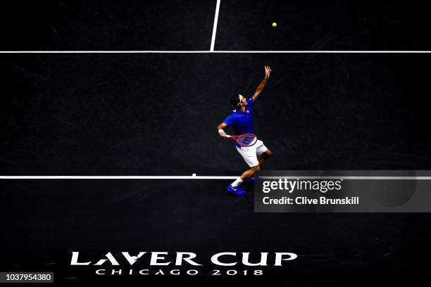 Team Europe Roger Federer of Switzerland serves a shot against Team World Nick Kyrgios of Australia during their Men's Singles match on day two of...