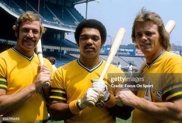 Outfielder Reggie Jackson , catcher Dave Duncan and infielder Mike Epstein of the Oakland Athletics pose together during a Major League Baseball game...