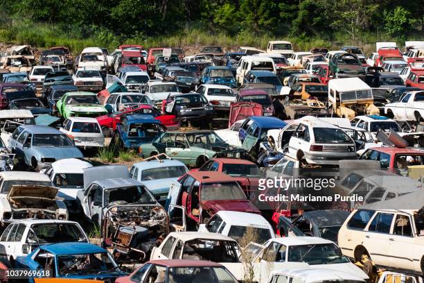 car wrecking yard - obsolete stock pictures, royalty-free photos & images