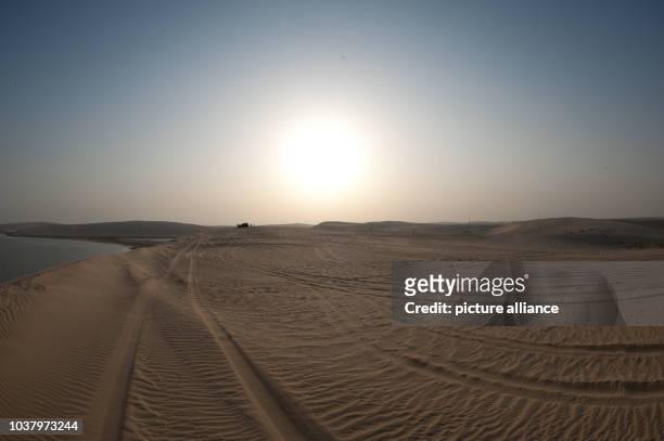 View of the desert near Doha, Qatar, 8 January 2013. Photo: Peter Kneffel | usage worldwide