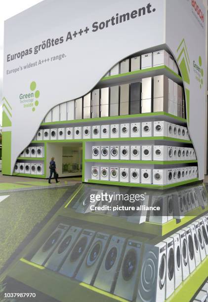Visitor alks through an installation of electronics and appliance manufacturer Bosch on the media day of the International radio exhibition in...