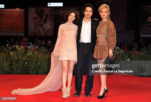 Actress Kiko Mizuhara, actor Kenichi Matsuyama and actress Rinko Kikuchi attends the "Norwegian Wood" premiere during the 67th Venice Film Festival...