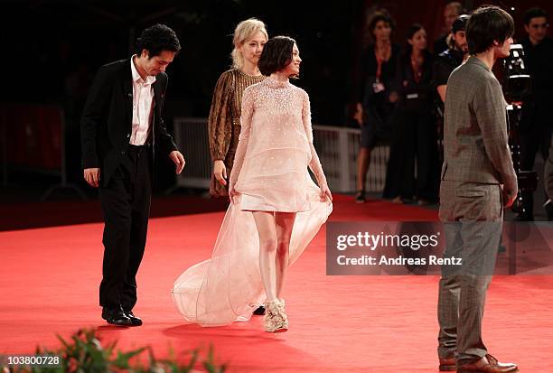 Director Anh Hung Tran, actress Kiko Mizuhara, actress Rinko Kikuchi and actor Kenichi Matsuyama attend the "Norwegian Wood" premiere during the 67th...