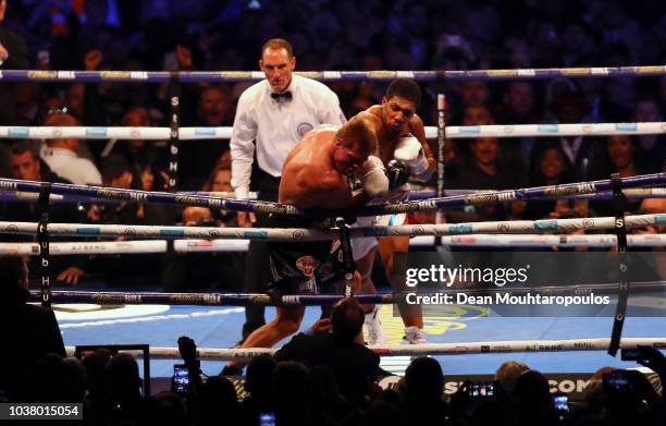 Anthony Joshua knocks out Alexander Povetkin during the IBF, WBA Super, WBO & IBO World Heavyweight Championship title fight between Anthony Joshua...