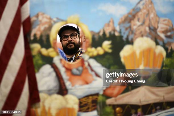 Ted Ohanlan of Albuquerque, NM is in the line for tasting beer. The Brewers Association hosted thousands of beer enthusiasts during the 36th Great...