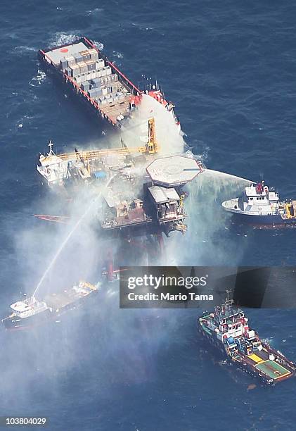Exploding Water Oil Rig Oil Rig Explodes In The Gulf Of Mexico Photos and Premium High Res ...