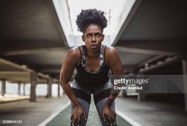 strong women - running marathon stock pictures, royalty-free photos & images