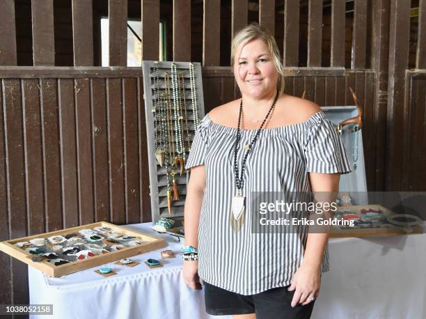 Vendors take photos infront of their booths during day 1 of Pilgrimage Music & Cultural Festival 2018 on September 22, 2018 in Franklin, Tennessee.
