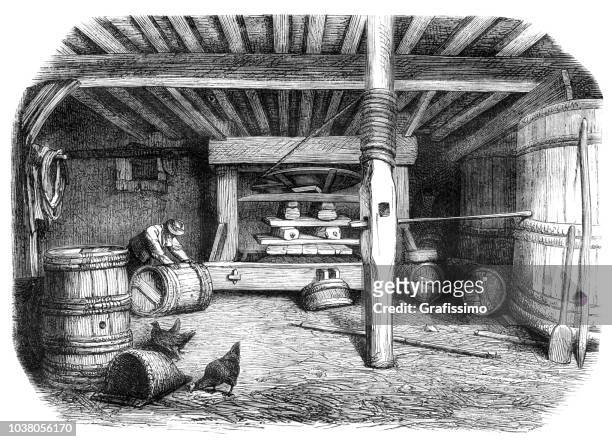 winemaker using wine press and barrel illustration - wooden wine press stock illustrations