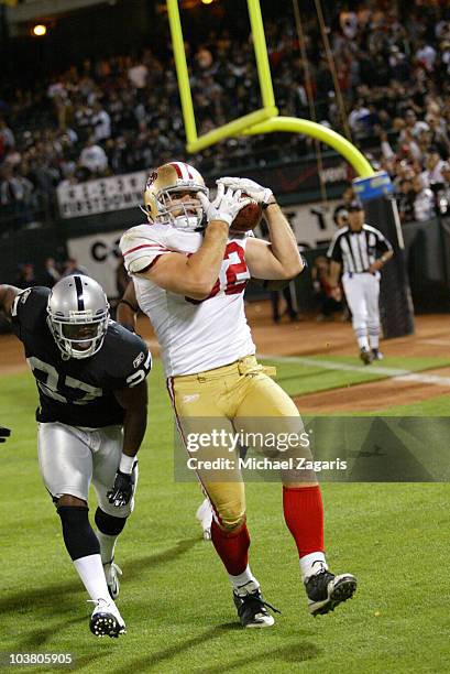 Nate Byham of the San Francisco 49ers grabbing a pass in the end zone for a two point conversion during the game against the Oakland Raiders at the...