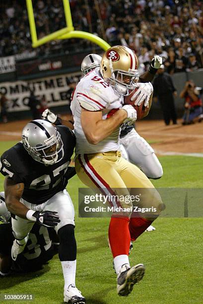 Nate Byham of the San Francisco 49ers grabbing a pass in the end zone for a two point conversion during the game against the Oakland Raiders at the...