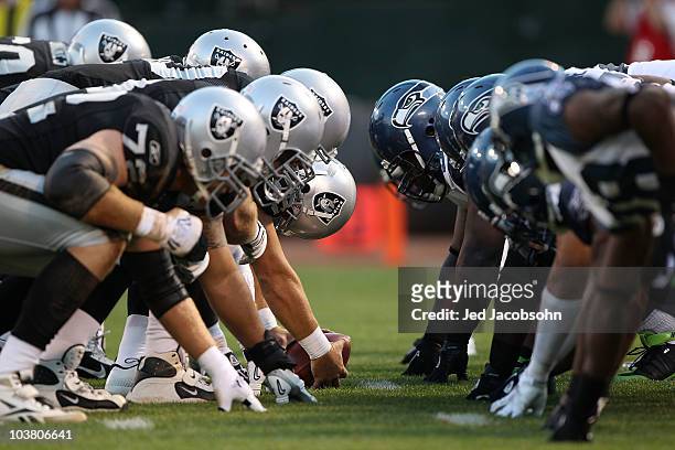 Members of the Seattle Seahawks line up against the Oakland Raiders during an NFL preseason game at Oakland-Alameda County Coliseum on September 2,...