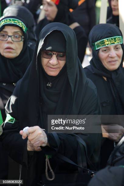Iranian Shiite Muslim mourners take part in a Muharram procession in Toronto, Ontario, Canada, on October 12, 2016. Hundreds of Shiite Muslims took...