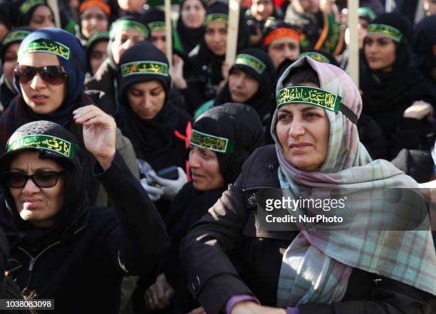 Iranian Shiite Muslim mourners take part in a Muharram procession in Toronto, Ontario, Canada, on October 12, 2016. Hundreds of Shiite Muslims took...