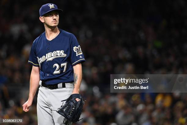 Zach Davies of the Milwaukee Brewers walks off the field in the third inning during the game against the Pittsburgh Pirates at PNC Park on September...