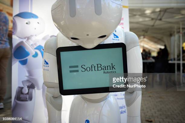 Portrait of a SoftBank robot. A robots race took place in Toulouse. Machines are either cars or walking robots. They were supposed to run a 110...