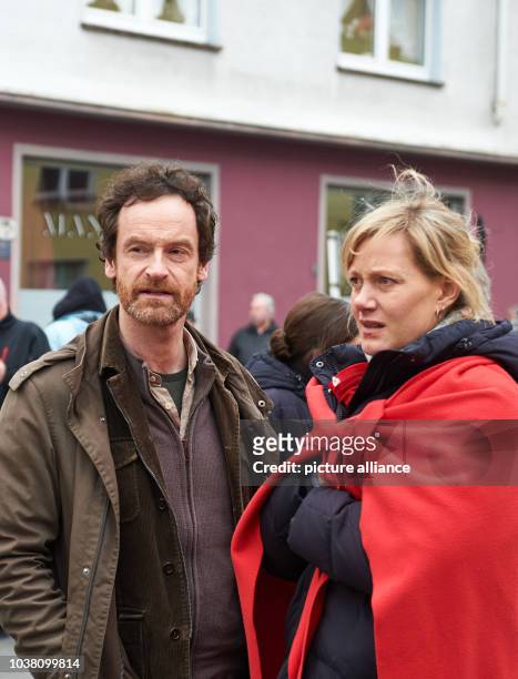 Actor Joerg Hartmann as commissar Faber and and Anna Schudt pictured on set during a break in filming for the Tatort episode "Zahltag", in Dortmund,...