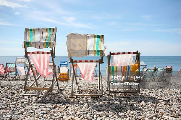 deckchairs - newfamily stock pictures, royalty-free photos & images