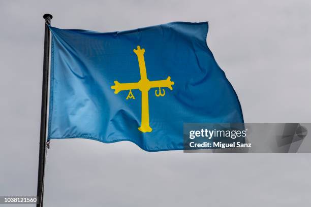 asturias flag waving in the wind - asturias imagens e fotografias de stock