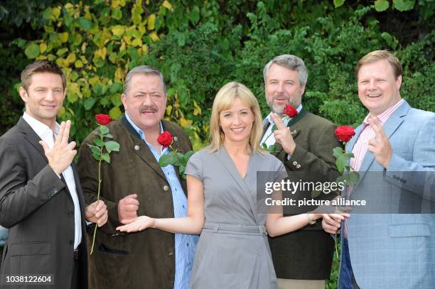 Actors Igor Jeftic , Joseph Hannesschlaeger, Katharina Abt, Dieter Fischer and Michael Grimm pose during the filming of television crime series 'Die...