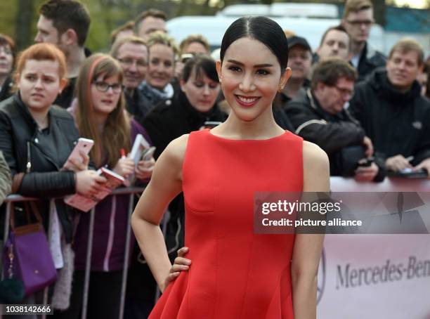 Actress Aisawanya Areyawattana arrive for the Grimme Prize award ceremony in Marl, Germany, 8 April 2016. Both were awarded in the category...