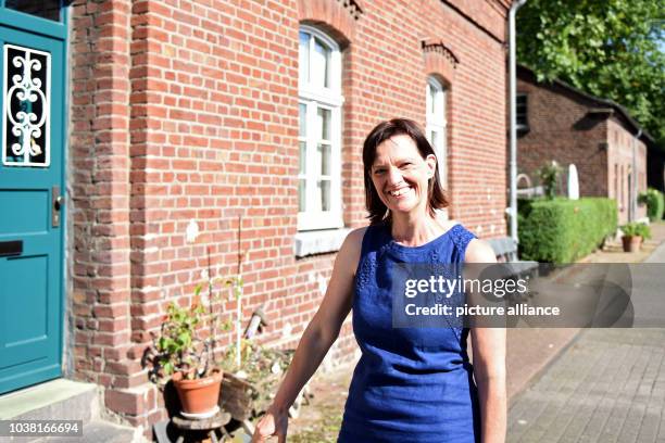Actress Karin Kettling stands in front of her flat in the workers' settlement in Eisenheim in Oberhausen, Germany, 19 August 2016. Photo: Caroline...