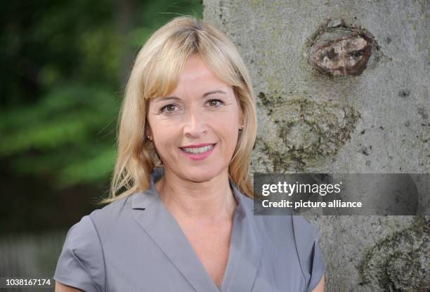 Actress Katharina Abt poses during the filming of television crime series 'Die Rosenheim-Cops' by German public broadcaster ZDF at the Bavaria...