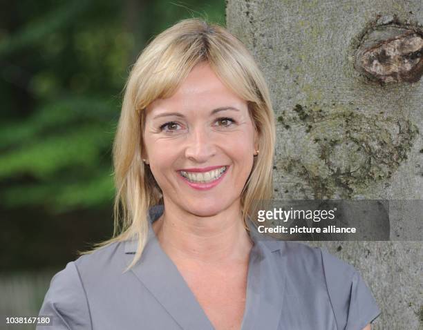 Actress Katharina Abt poses during the filming of television crime series 'Die Rosenheim-Cops' by German public broadcaster ZDF at the Bavaria...