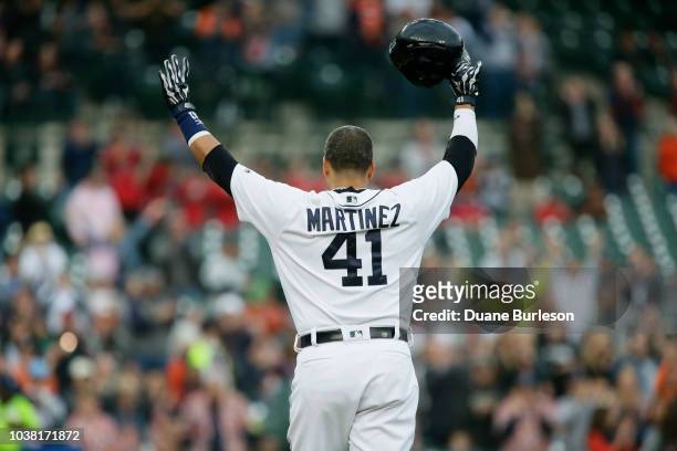 Victor Martinez of the Detroit Tigers acknowledges the fans as he leaves the field after hitting a single during the first inning of a game against...