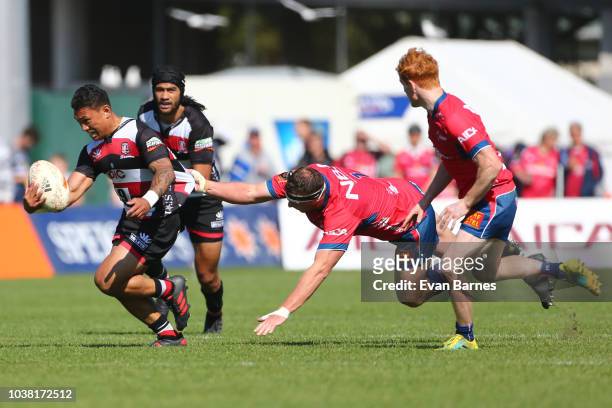 Wyatt Crockett tries to hold on to Te Aihe Toma during the round six Mitre 10 Cup match between Tasman and Counties Manakau on September 23, 2018 in...