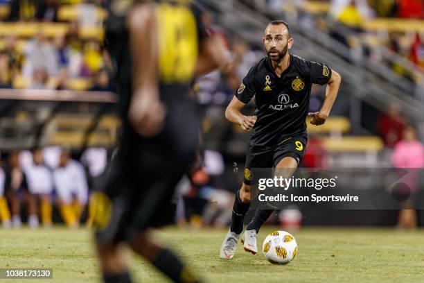 Columbus Crew forward Pedro Santos looks for an open man in the MLS regular season game between the Columbus Crew SC and the Colorado Rapids on...