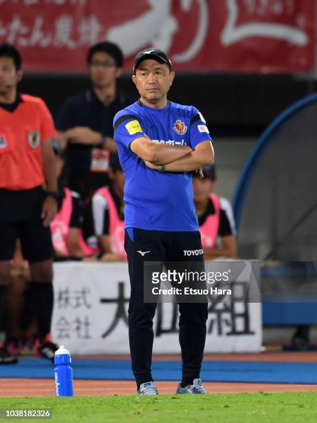 Nagoya Grampus head coach Yahiro Kazama looks on during the J.League J1 match between Kawasaki Frontale and Nagoya Grampus at Todoroki Stadium on...