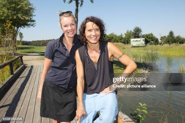 Actress Ulrike Volkerts and her partner Katharina Schnitzler pose in the context of the GRK Golf Charity Masters in Machern near Leipzig, Germany, 27...