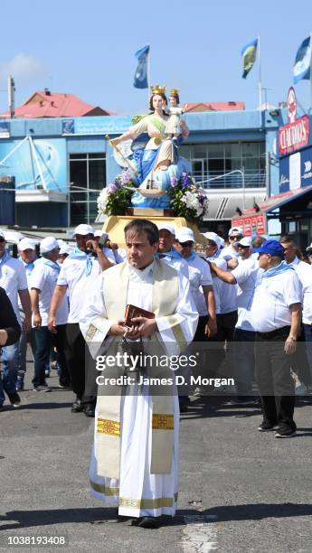 Father Pierluigi Passoni leads the procession during the blessing of the fleet celebrations at Sydney Fish Market on September 23, 2018 in Sydney,...