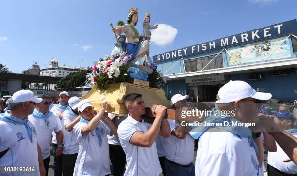 The procession of the Madonna - a replica statue of the Santa Maria Di Porto Salvo, the guardian of safe ports and safe harbour during the blessing...