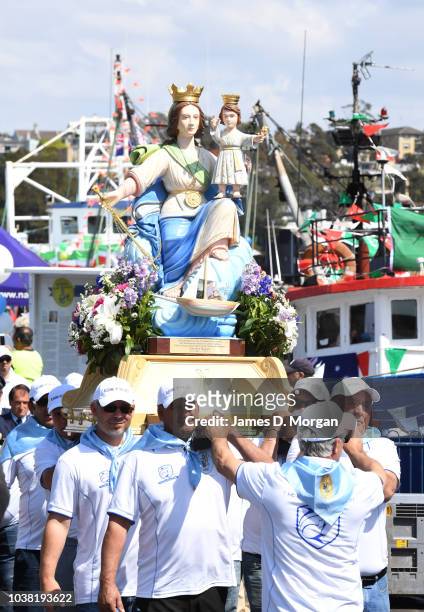 The procession of the Madonna - a replica statue of the Santa Maria Di Porto Salvo, the guardian of safe ports and safe harbour during the blessing...