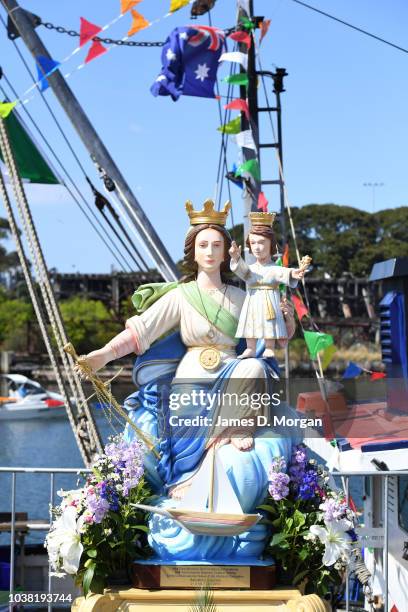 The Madonna - a replica statue of the Santa Maria Di Porto Salvo, the guardian of safe ports and safe harbour during the blessing of the fleet...