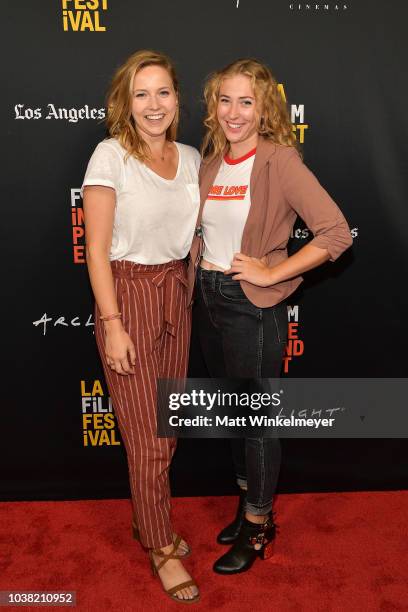 Caroline Clark and Katherine Dudas attend the 2018 LA Film Festival screening of "Behind The Curve" at ArcLight Hollywood on September 22, 2018 in...